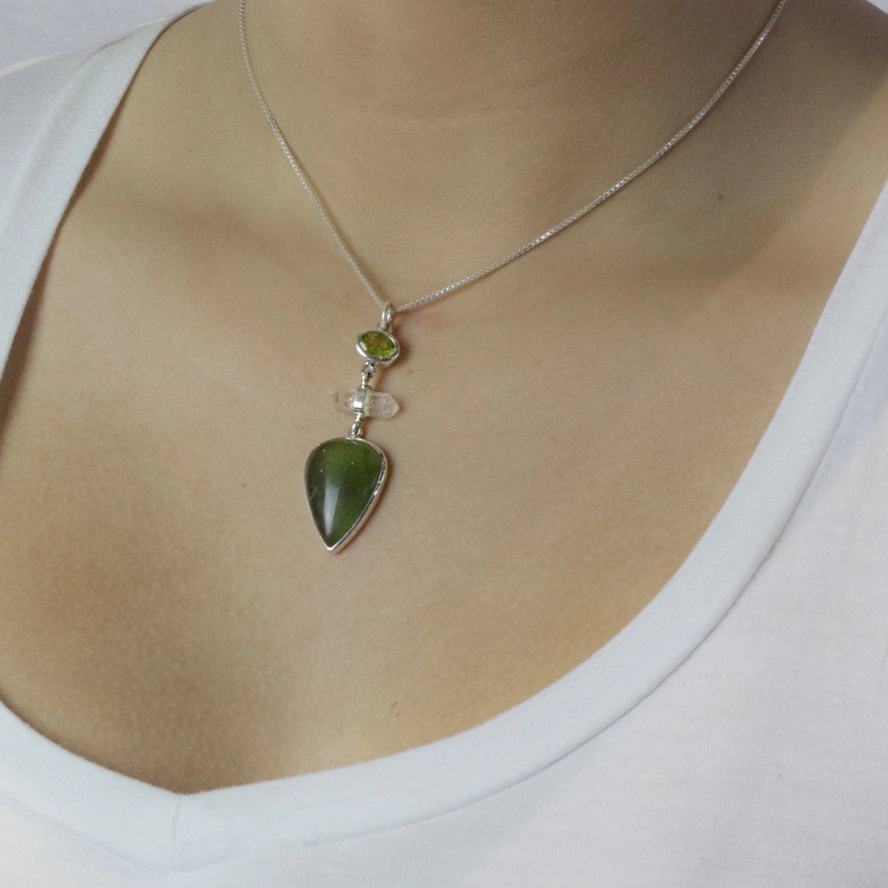 Model Wearing Peridot, Laser Quartz, Jade necklace