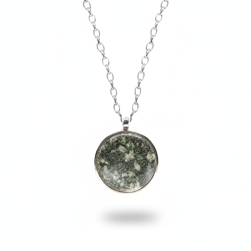 Round preselite cabochon pendant with soft green tones in sterling silver necklace