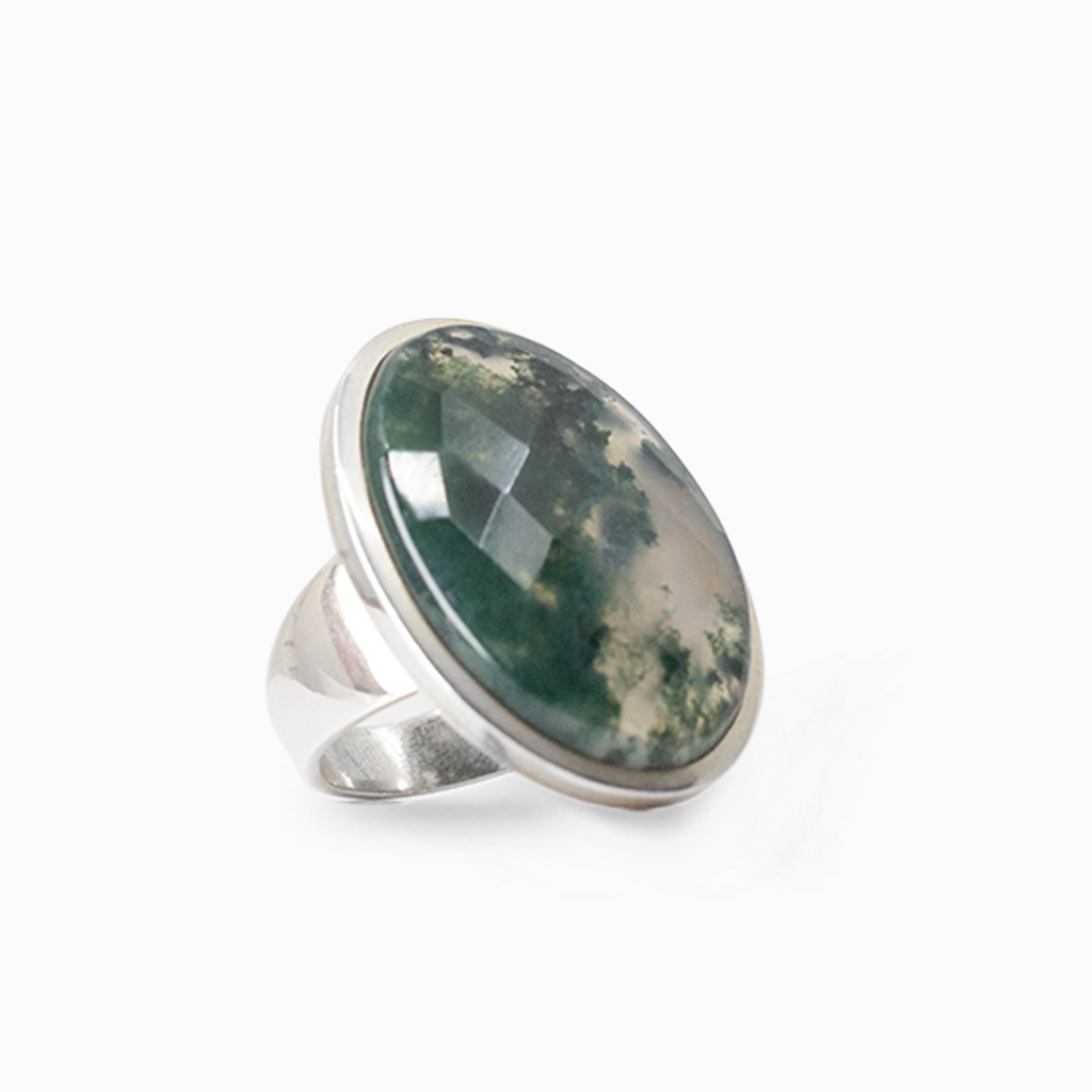 Oval Moss Agate gemstone with natural forest-green inclusions framed in polished sterling silver.