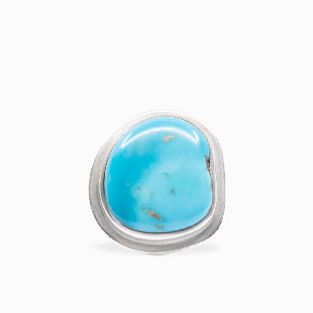 Bright blue Sleeping Beauty Turquoise cabochon ring set in a smooth polished 925 sterling silver bezel.