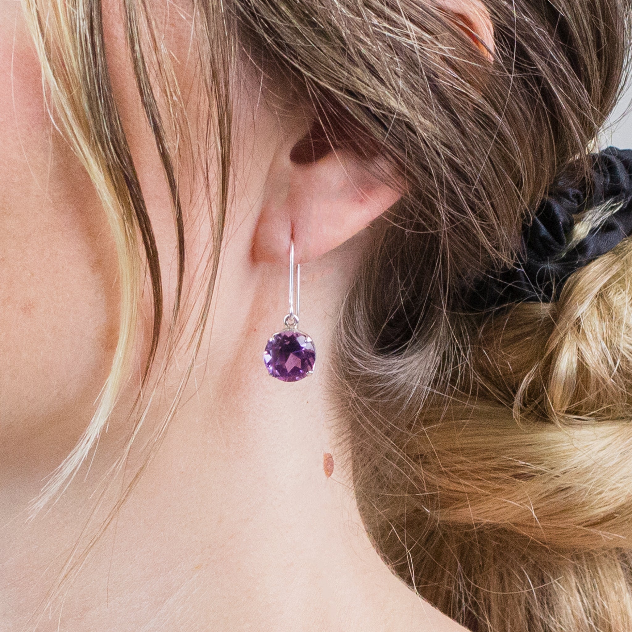 FACETED ROUND AMETHYST DROP EARRINGS ON MODEL