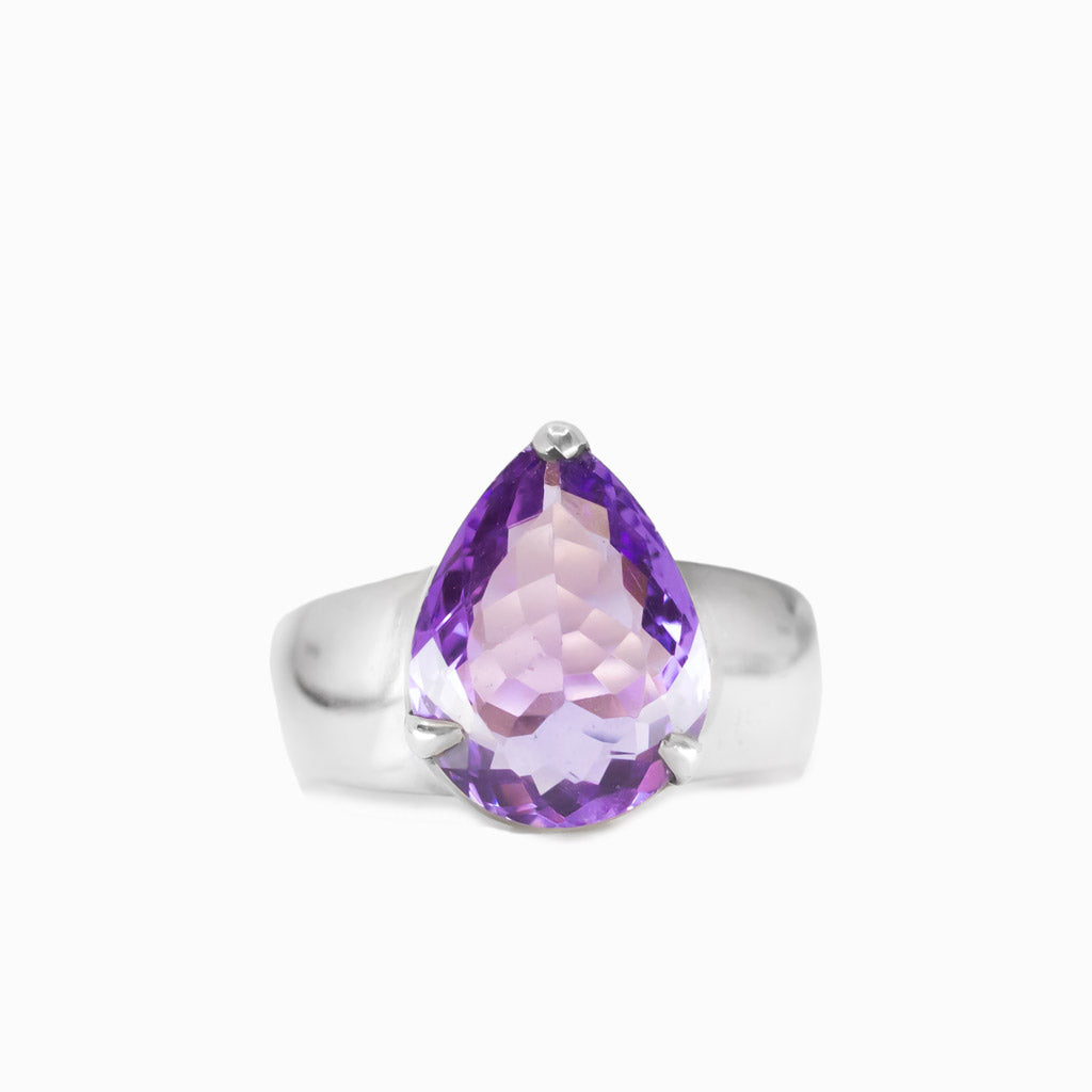 Faceted tear shaped amethyst claw ring in sterling silver