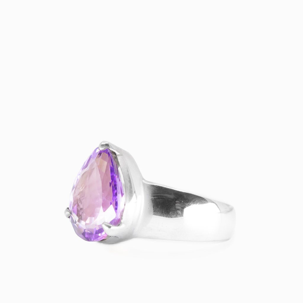 Faceted tear shaped amethyst claw ring in sterling silver