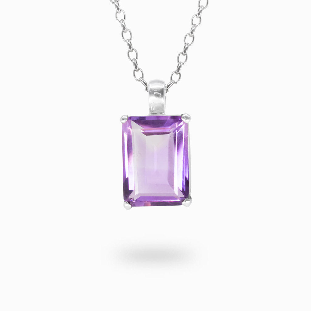 Rectangular step-cut purple Amethyst pendant in a four-prong polished 925 sterling silver setting.