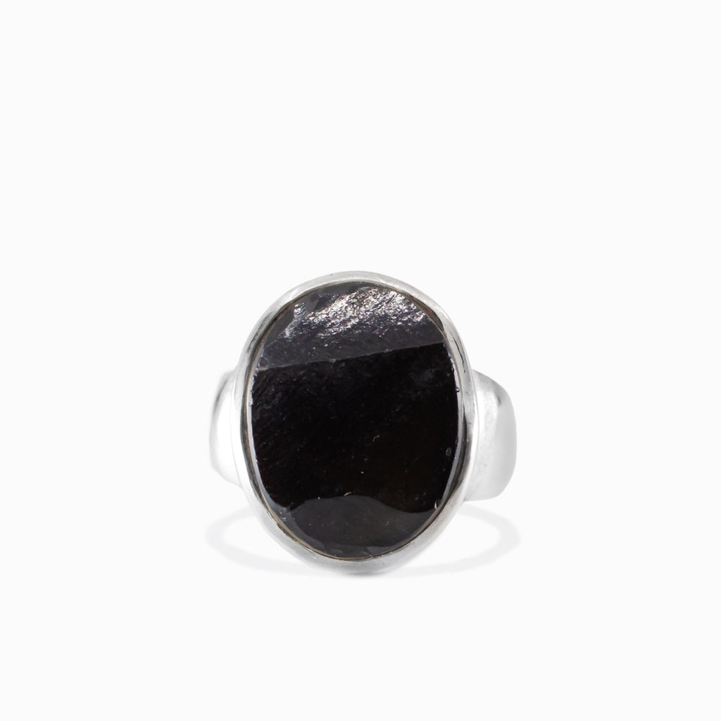 Raw oval apache obsidian ring in sterling silver
