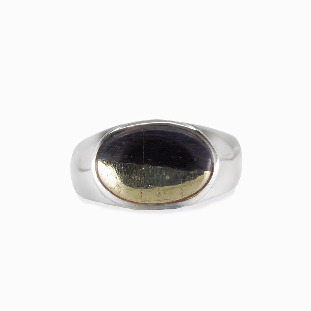 Apache gold oval cabochon ring in sterling silver with gold and black contrast