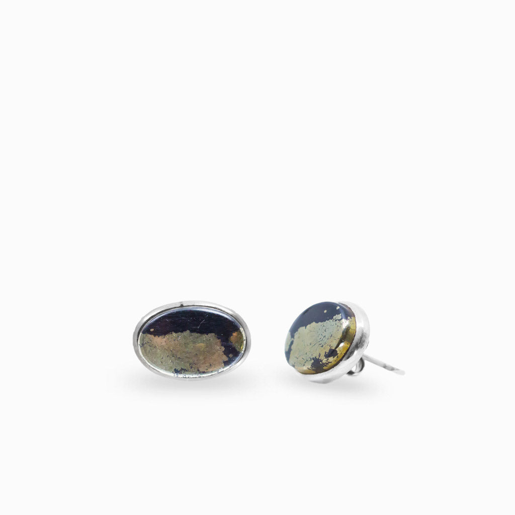 Oval apache gold stud earrings in sterling silver bezel setting