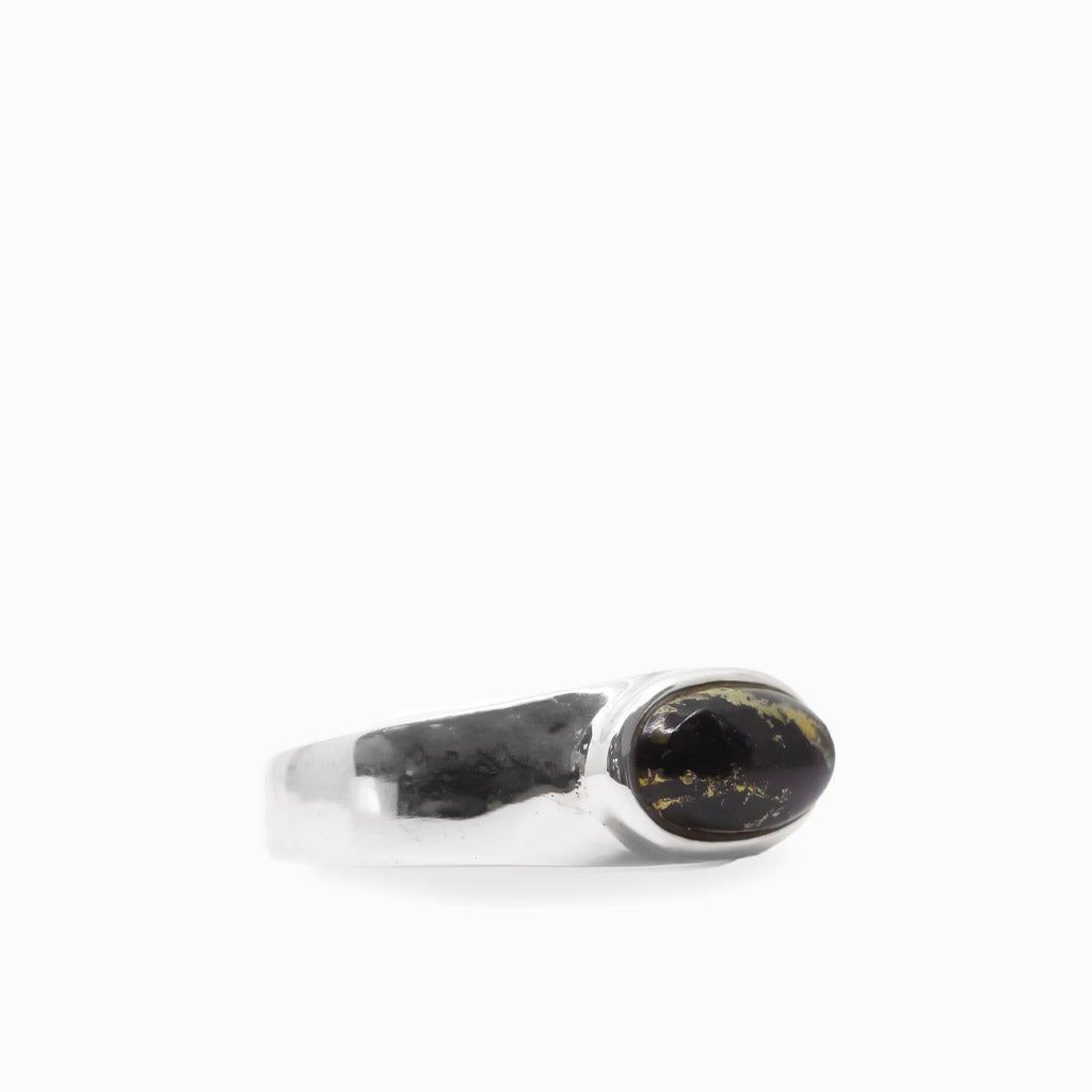 Oval black and metallic gold Apache Gold cabochon bezel set in a polished 925 sterling silver ring.
