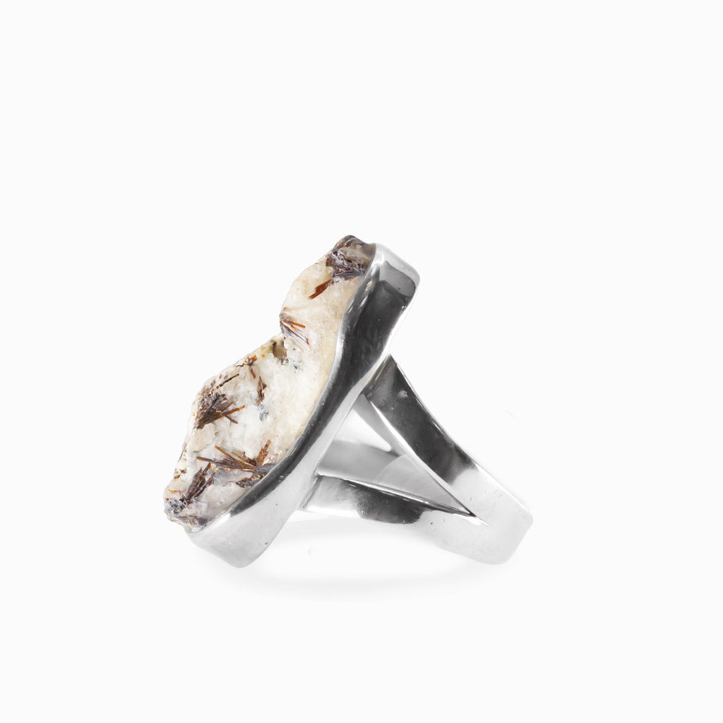 Freeform Astrophyllite gemstone ring with natural bronze inclusions in sterling silver.