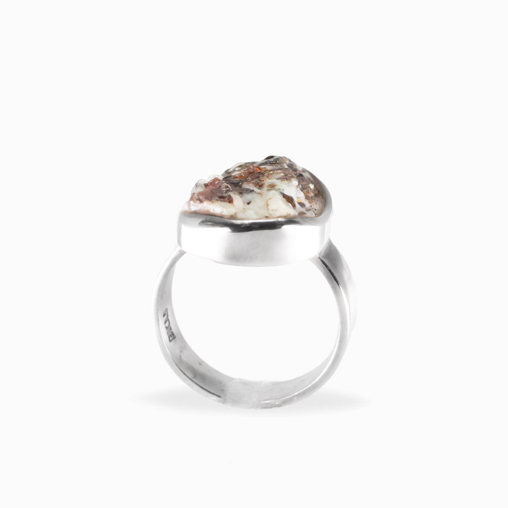 Freeform oval Astrophyllite ring with bronze, cream and metallic formations set in polished 925 sterling silver.