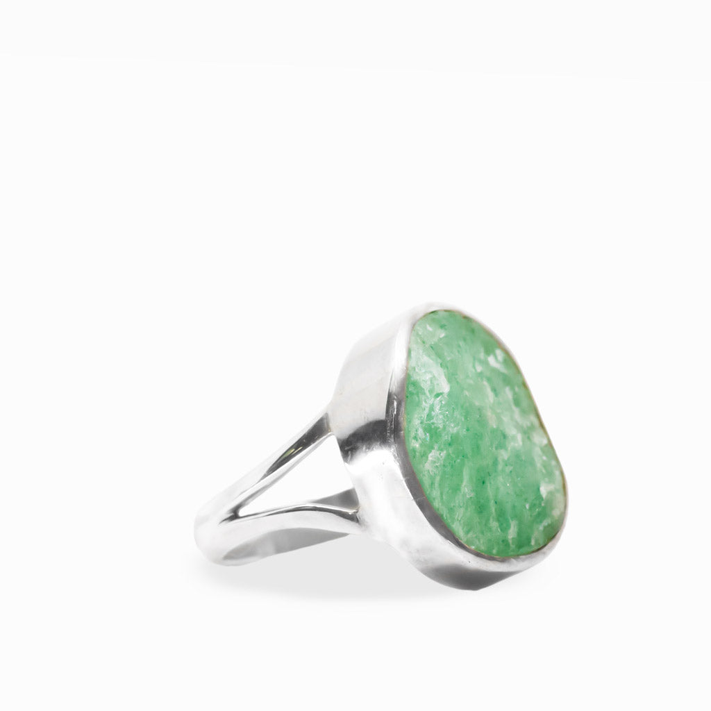 Round mint-green Aventurine ring with natural crystalline texture, polished sterling silver bezel setting, and split band.