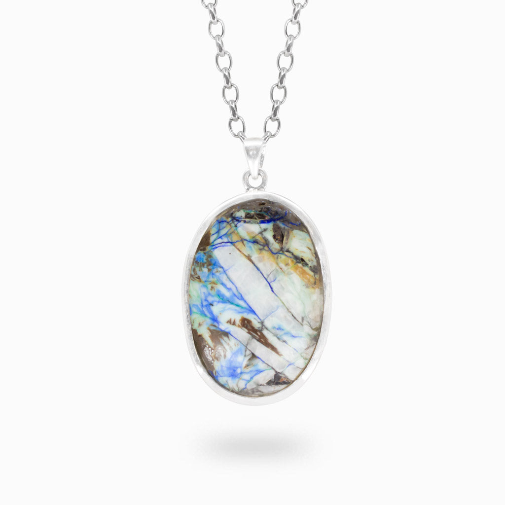 Oval Azurite Turquoise pendant with blue veining and natural matrix in polished 925 sterling silver.