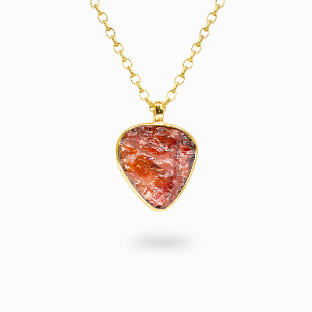 Freeform Spessartine Garnet pendant in polished 14K gold vermeil over sterling silver.