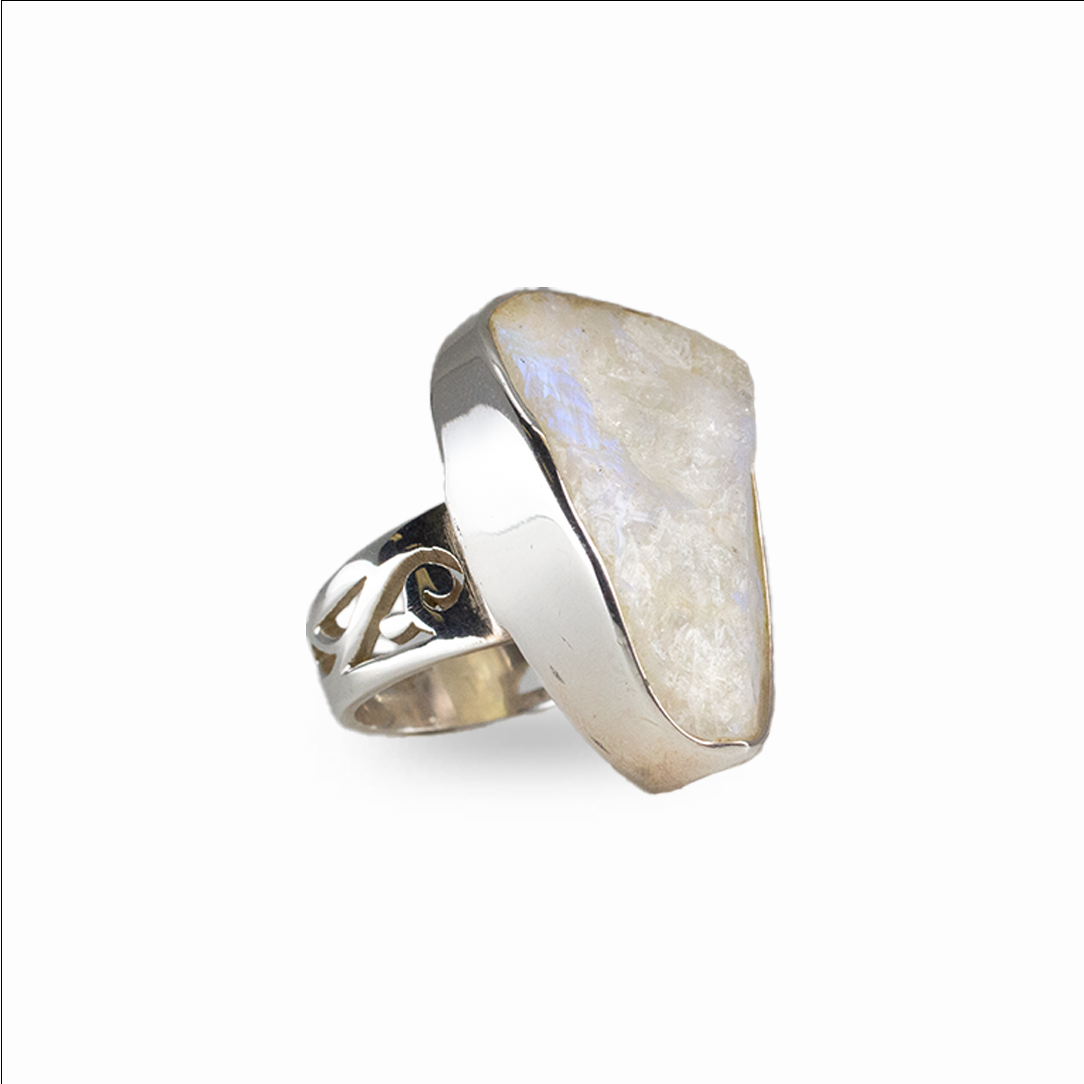Raw rainbow moonstone ring with white stone and blue flash set in silver