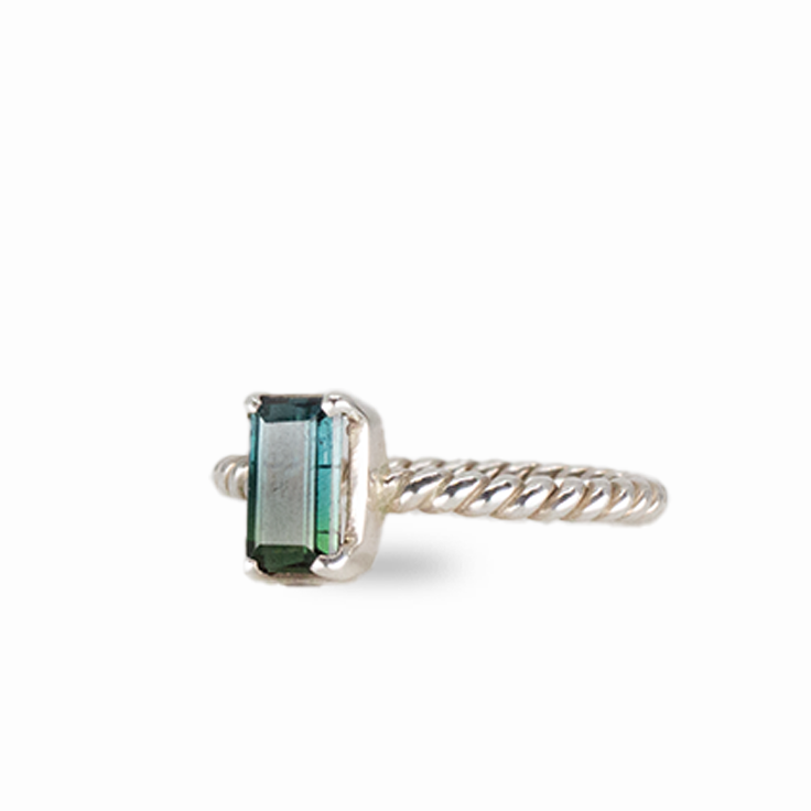 Faceted rectangle blue tourmaline ring set in sterling silver with emerald-cut gemstone