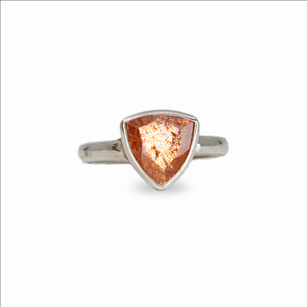 Triangle sunstone ring with warm golden shimmer set in sterling silver