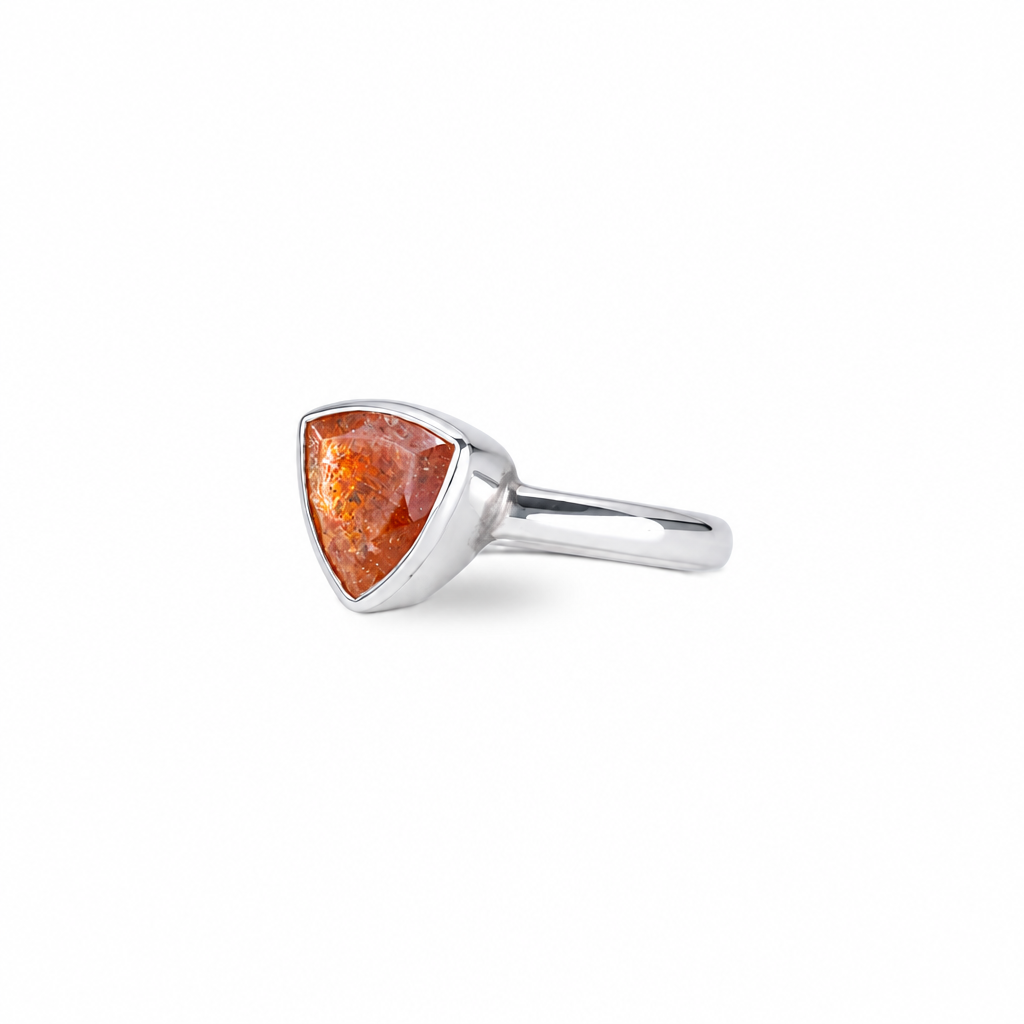 Triangle sunstone ring with warm golden shimmer set in sterling silver