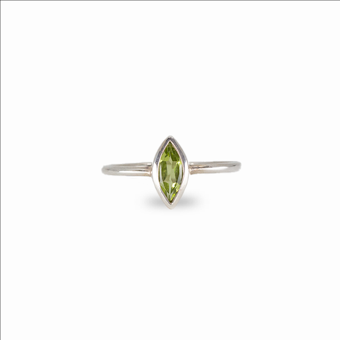 Green peridot ring set in sterling silver with minimalist design