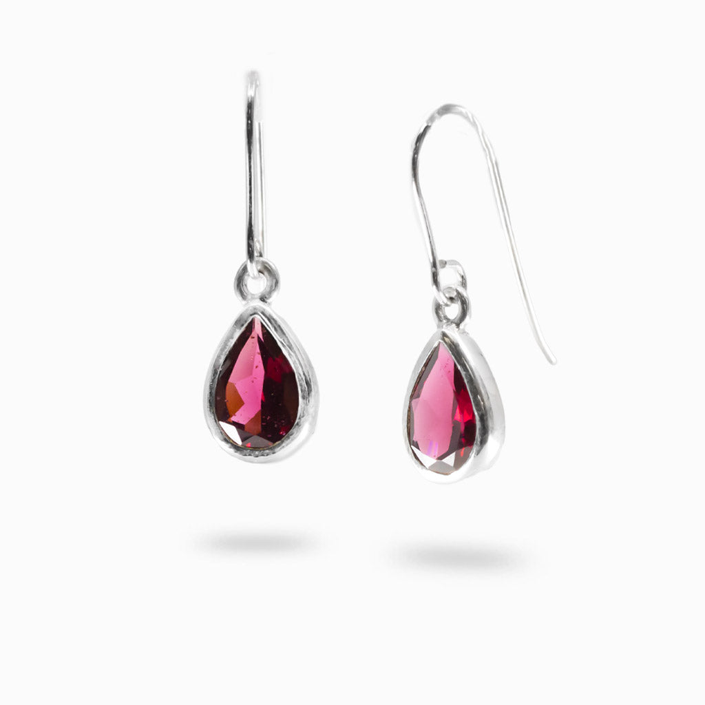 Faceted teardrop Garnet earrings in polished 925 sterling silver with rich crimson-red gemstones and classic hook ear wires.