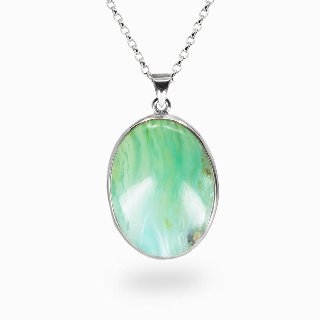 Oval Andean Opal pendant with swirling aqua and green patterns, set in sterling silver on a chain. | MADE IN EARTH