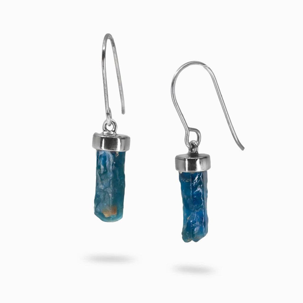 Raw Apatite crystal drop earrings in sterling silver featuring vibrant blue hexagonal stones. | MADE IN EARTH