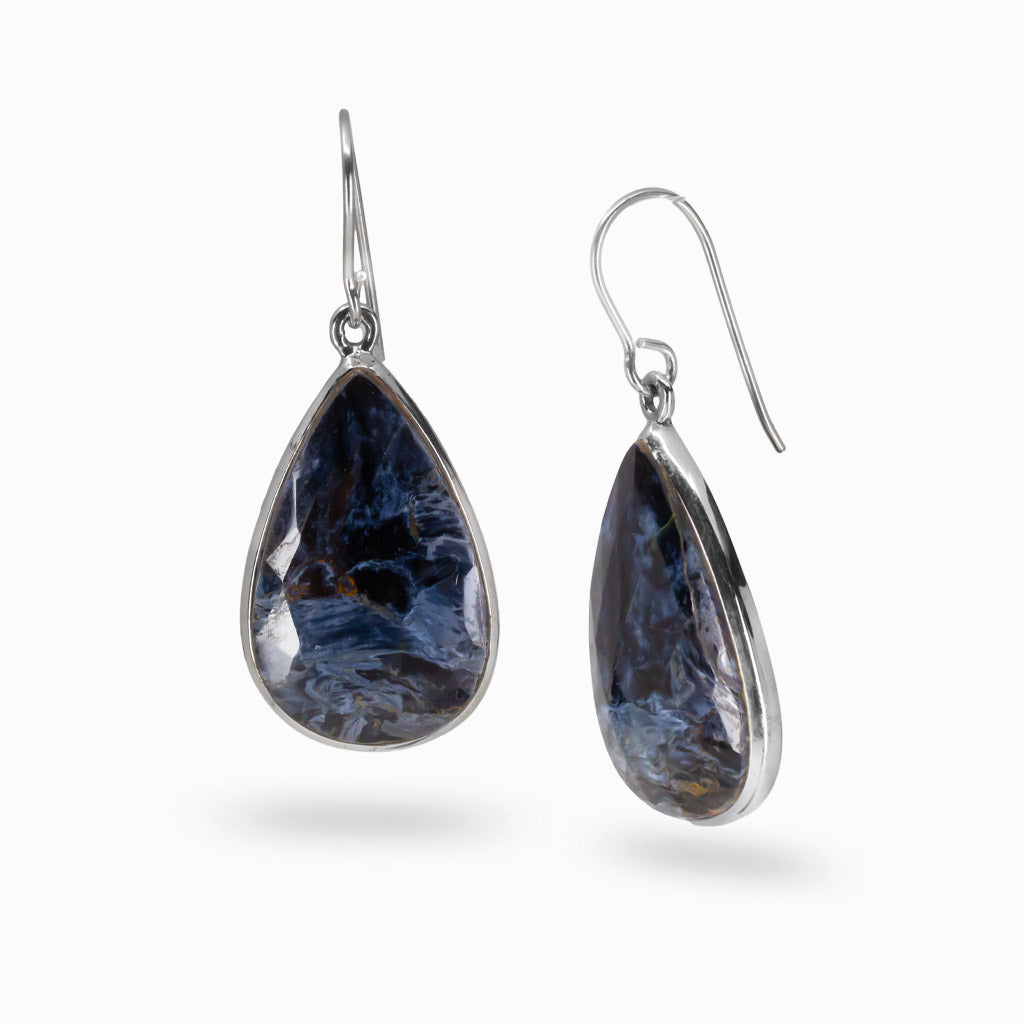 Faceted Pietersite teardrop earrings in sterling silver with swirling navy and gold patterns. | MADE IN EARTH