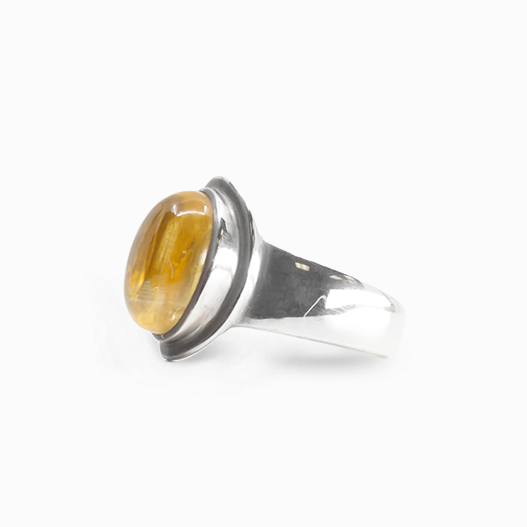 Oval golden-yellow Citrine cabochon ring set in polished 925 sterling silver.