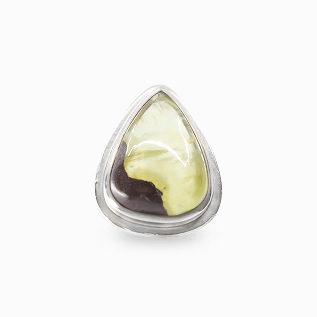 Pear-shaped yellow-green Prehnite cabochon ring with natural inclusion in polished 925 sterling silver.