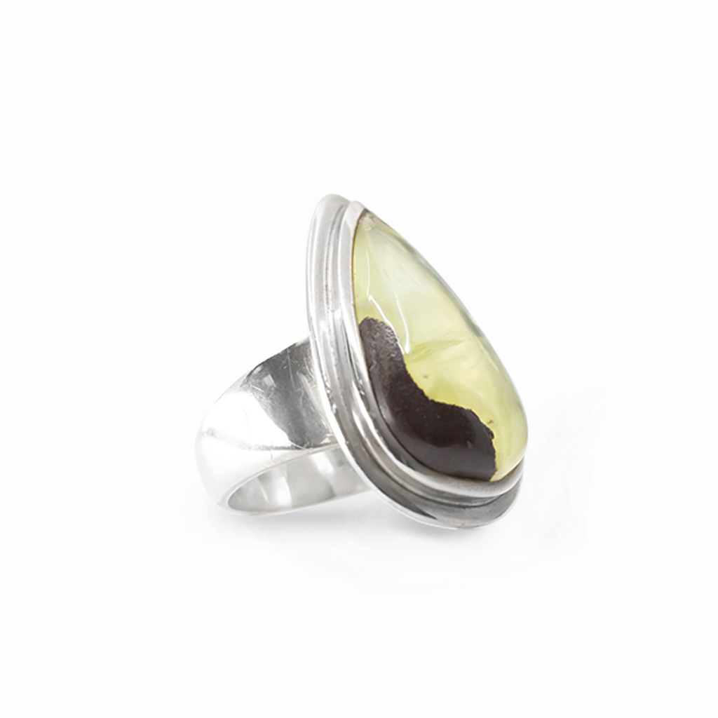 Pear-shaped yellow-green Prehnite cabochon ring with natural inclusion in polished 925 sterling silver.