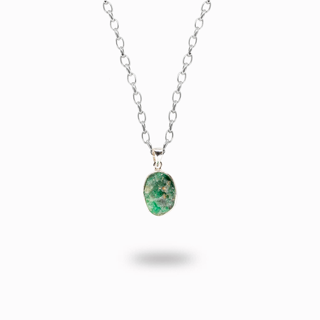 Raw emerald pendant necklace in sterling silver