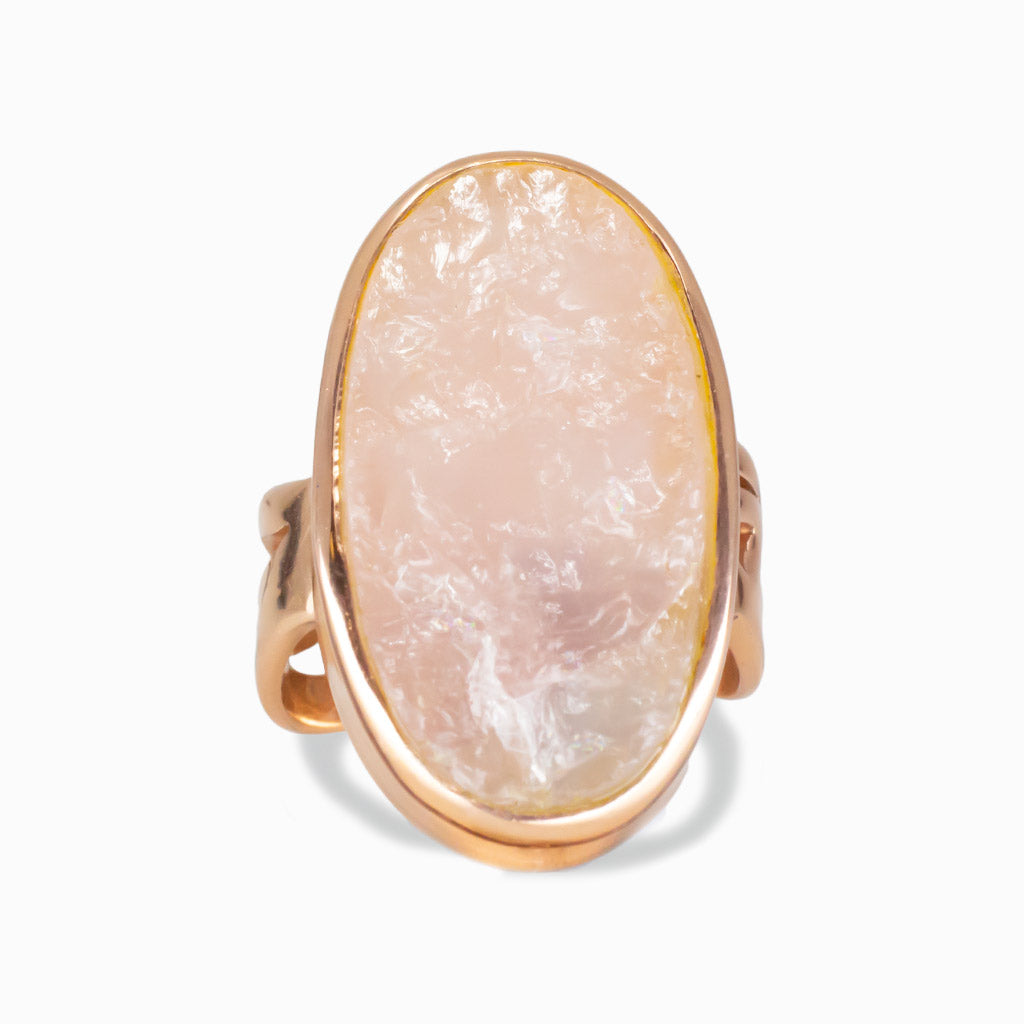 Rose Gold Vermeil Raw Rose Quartz Oval Ring front view—soft pink raw stone in oval bezel setting. | MADE IN EARTH