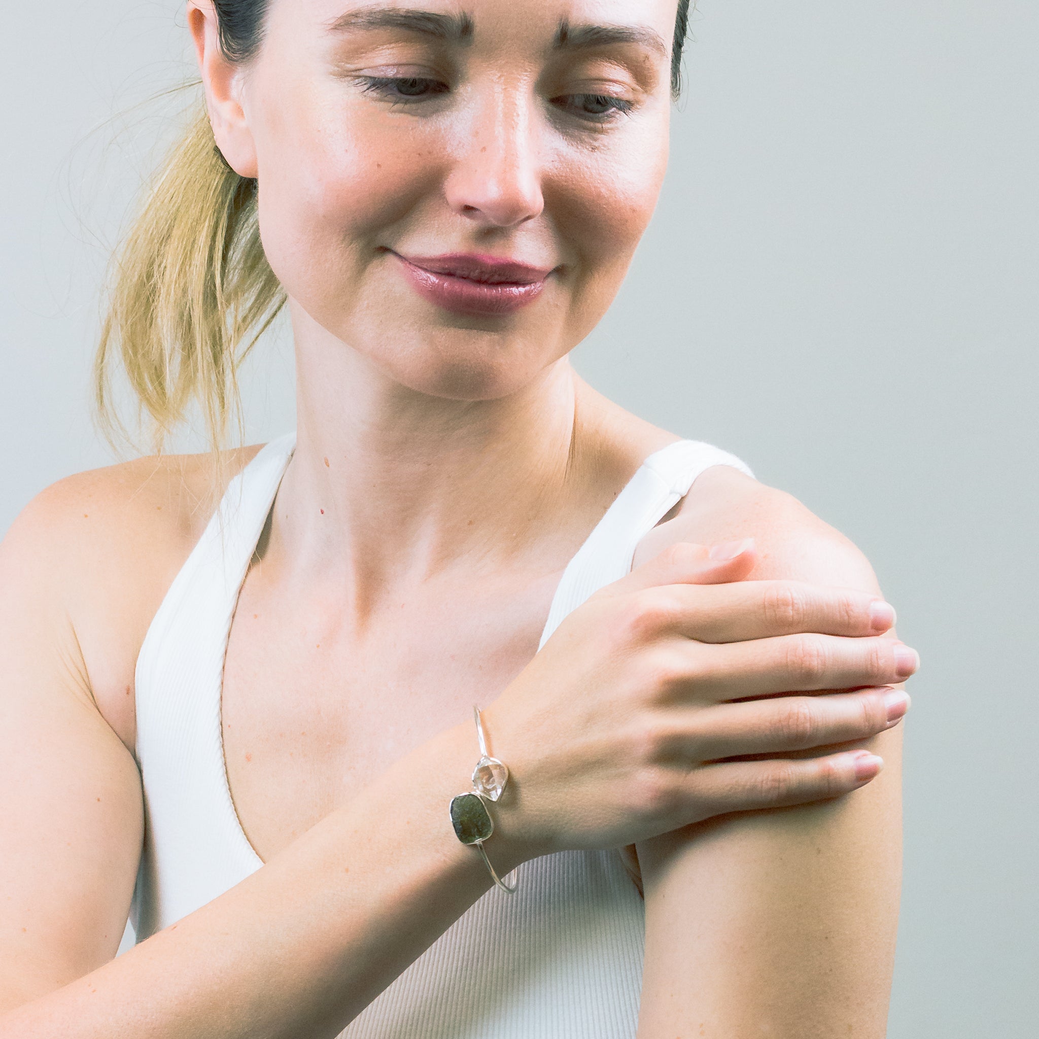 HERKIMER DIAMOND AND MOLDAVITE BRACELET ON MODEL