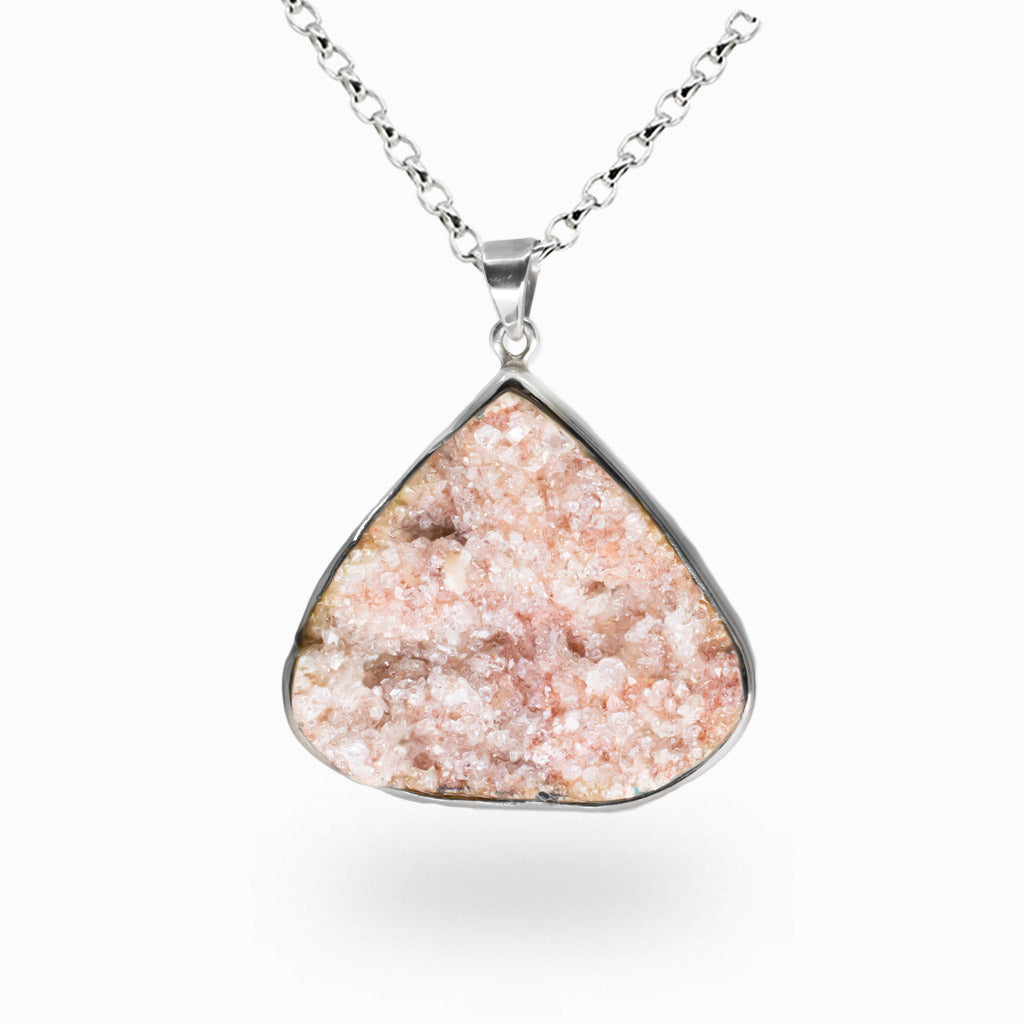 Raw pink apophyllite druzy crystal necklace set in sterling silver with natural sparkling crystal formations. | MADE IN EARTH