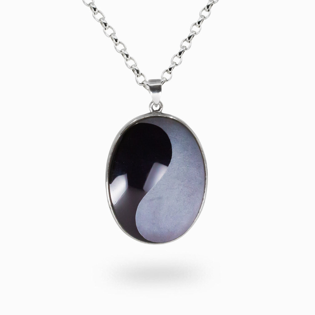 Black and grey obsidian yin yang pendant in sterling silver setting