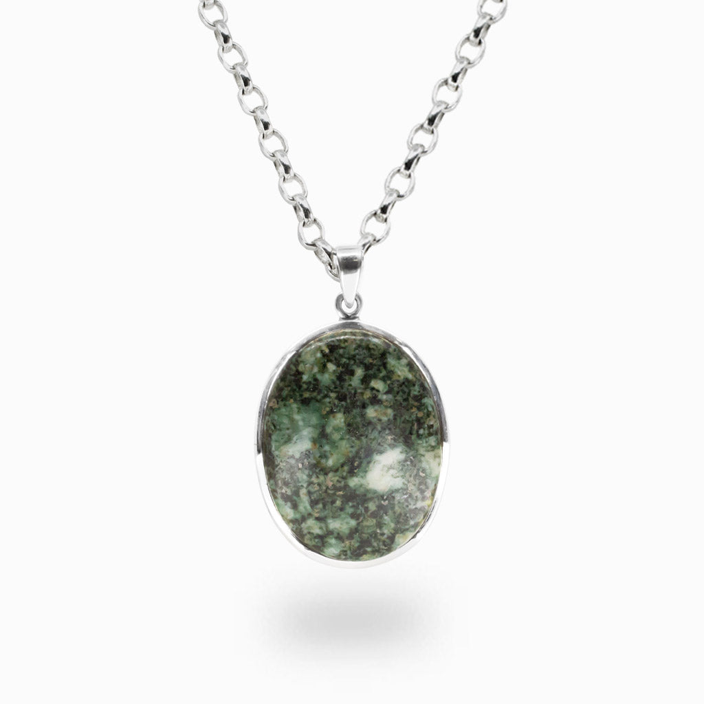 Oval PRESELITE cabochon pendant necklace in sterling silver bezel setting featuring a pale green gemstone.