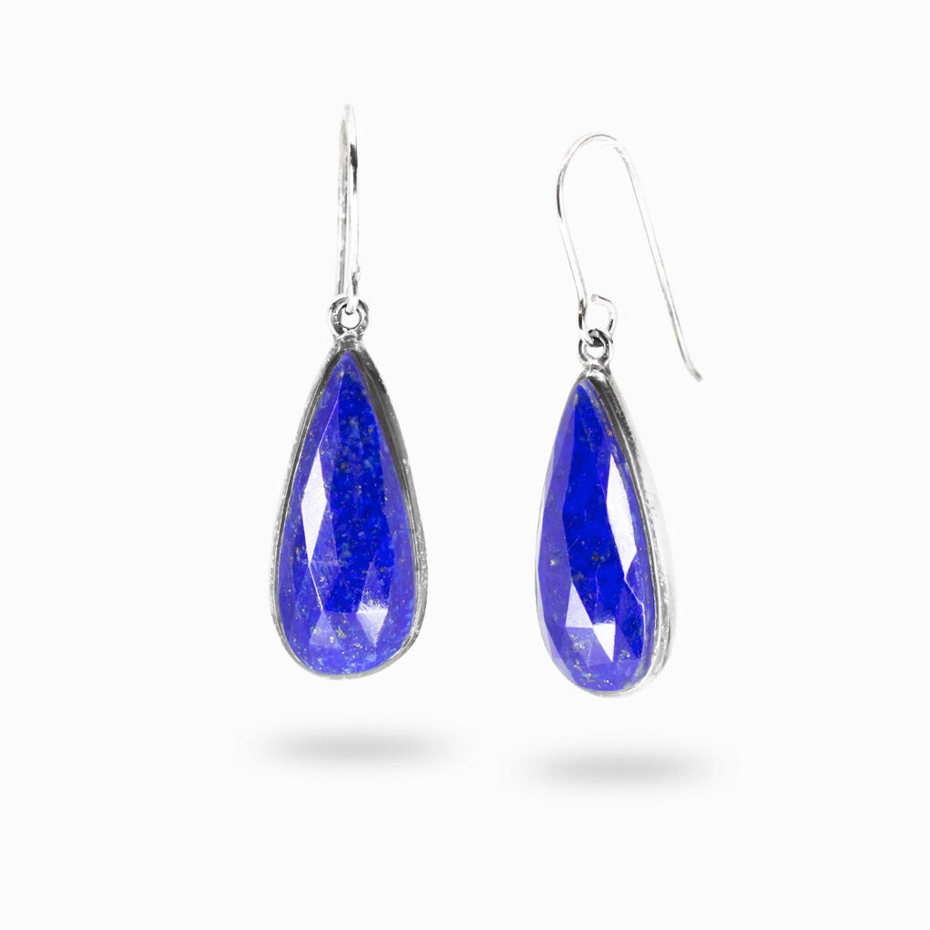 Faceted lapis lazuli teardrop drop earrings in sterling silver with deep blue gemstone and polished sparkle