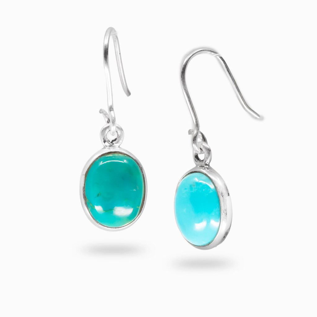 Firoza turquoise oval cabochon earrings in sterling silver with bright blue stone and natural matrix