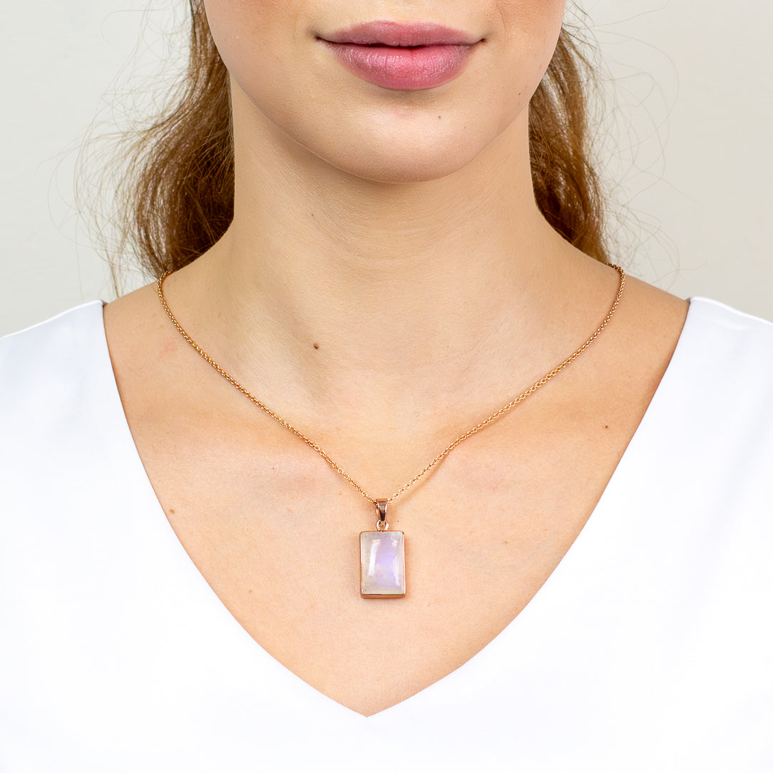 Rectangular cabochon Rainbow Moonstone pendant necklace in rose gold vermeil.