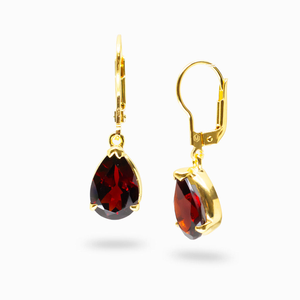 Faceted garnet teardrop drop earrings in yellow gold vermeil with deep red gemstone and polished shine