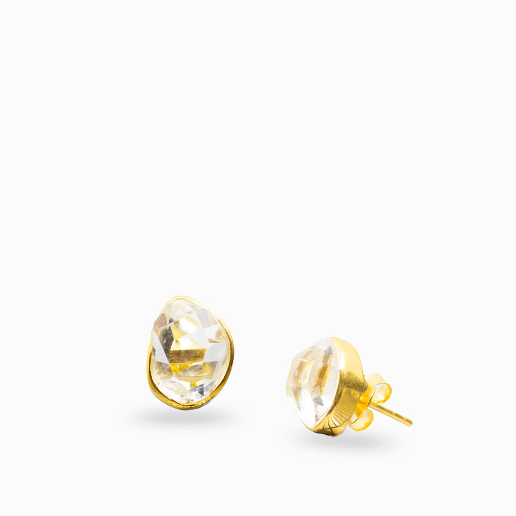 Raw Herkimer diamond bezel stud earrings in yellow gold vermeil with natural clear quartz crystal