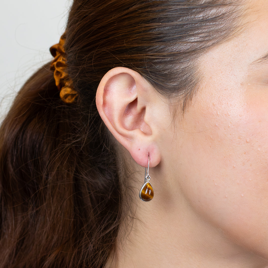 Teardrop tiger eye earrings in sterling silver ON MODEL
