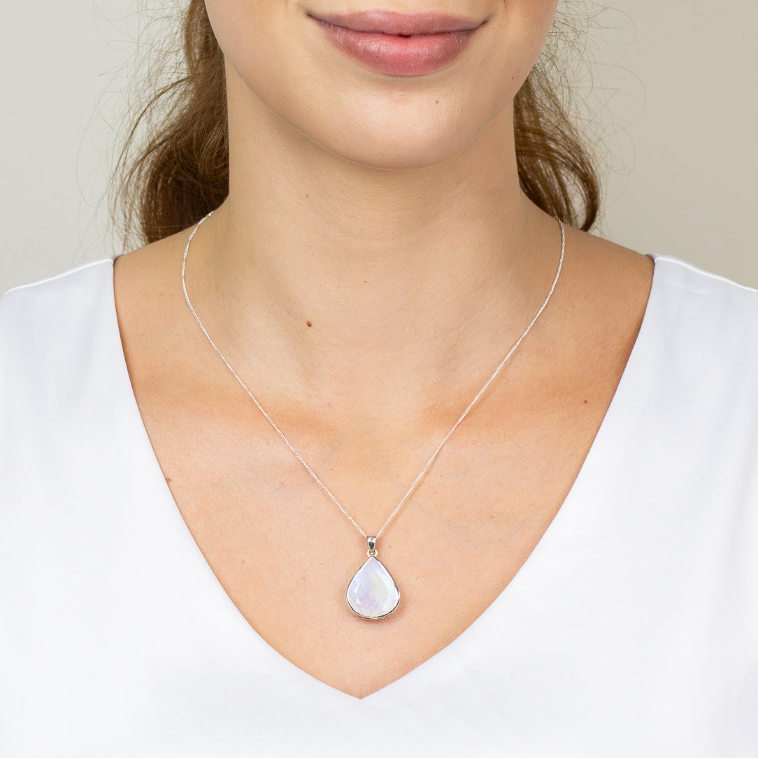 Faceted teardrop rainbow moonstone necklace in sterling silver ON MODEL