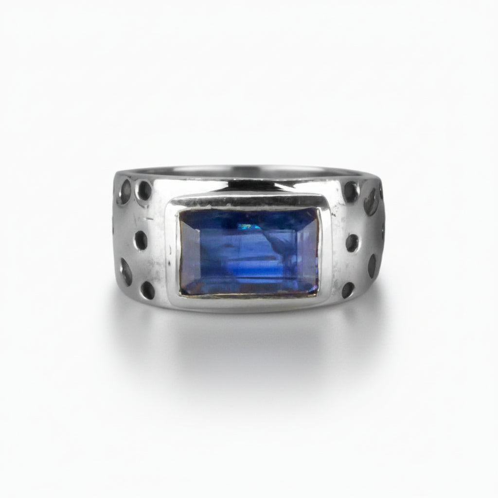 Faceted rectangle Kyanite ring with textured sterling silver band featuring layered blue and white gemstone. | MADE IN EARTH