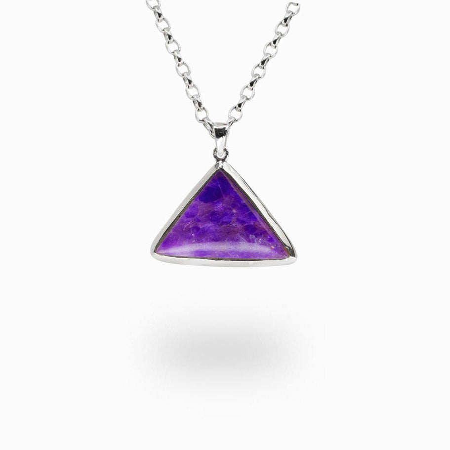 Triangle-shaped Sugilite gemstone pendant set in sterling silver with matching silver chain.