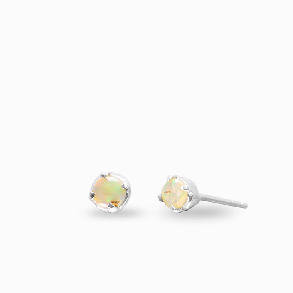 Faceted precious opal stud earrings in sterling silver