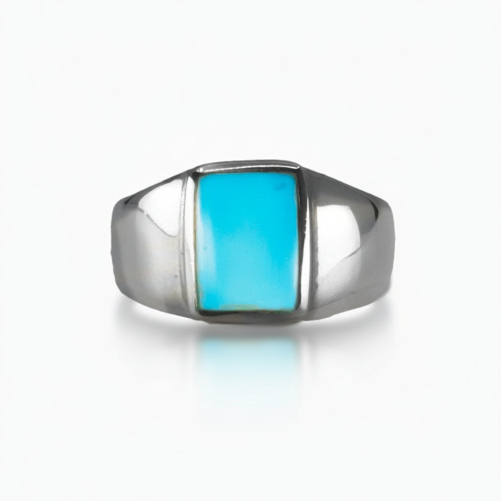 Sleeping Beauty Turquoise rectangular cabochon ring in sterling silver with vibrant sky-blue gemstone. MADE IN EARTH