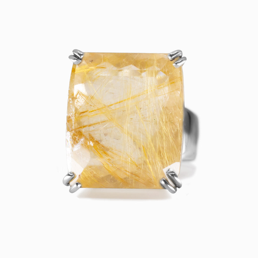 Rectangular faceted golden rutilated quartz ring set in sterling silver with golden rutile threads. MADE IN EARTH