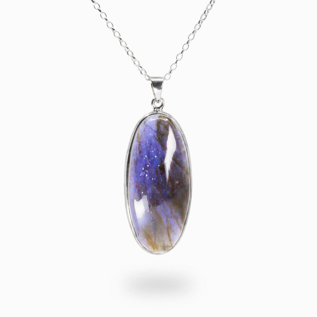 Oval Iolite cabochon necklace in sterling silver with luminous blue-violet transparency and natural shimmer. | MADE IN EARTH 