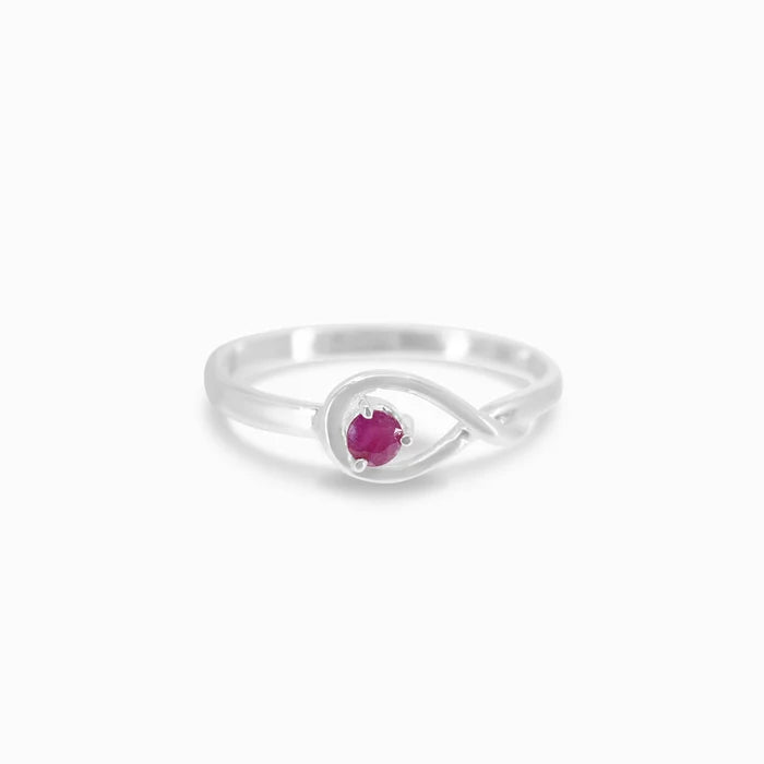 Round faceted Ruby gemstone prong set in polished sterling silver ring.