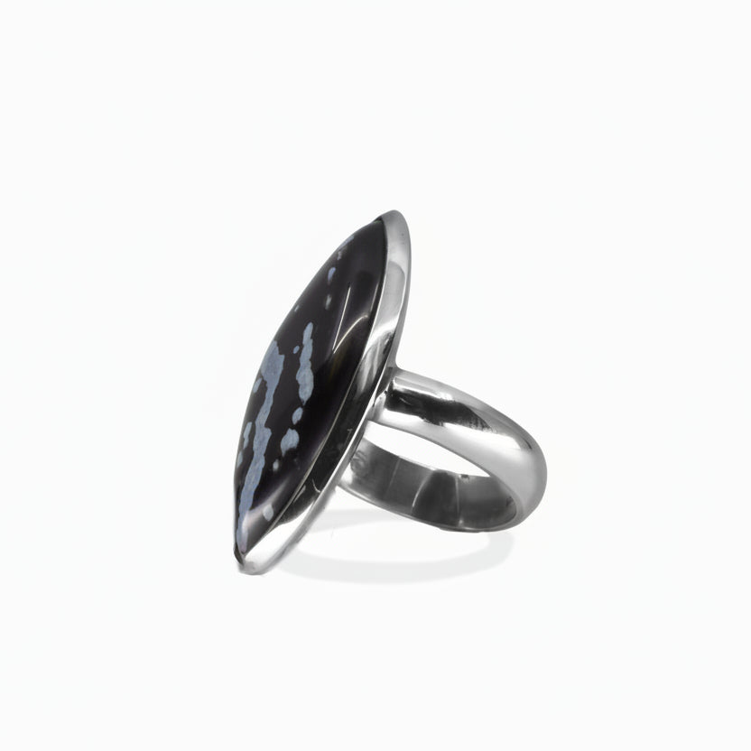 Marquise snowflake obsidian cabochon ring set in sterling silver with black and white stone. MADE IN EARTH